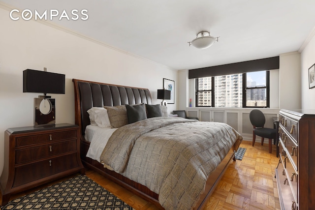 bedroom featuring crown molding