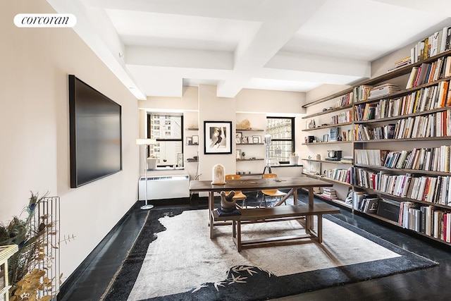 office area featuring baseboards, beam ceiling, wood finished floors, and coffered ceiling