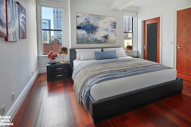 bedroom featuring dark hardwood / wood-style floors