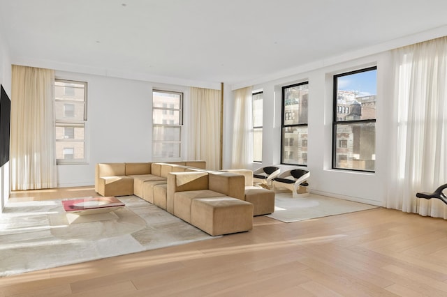 living area featuring parquet floors