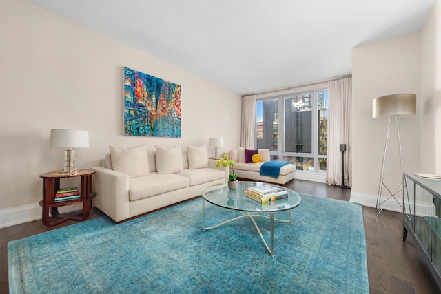 50 Riverside Blvd Unit 11J, New York City, NY 10069 - living area featuring baseboards and dark wood-style floors