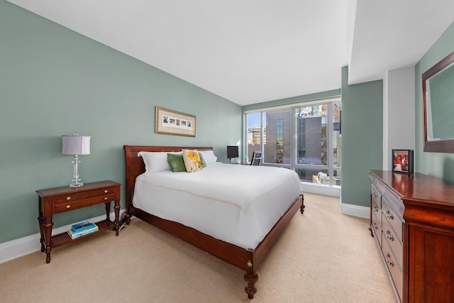 50 Riverside Blvd Unit 11J, New York City, NY 10069 - bedroom featuring baseboards and light colored carpet