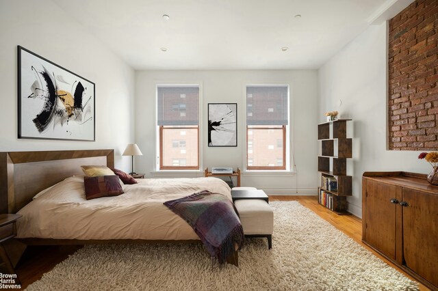 bedroom with light hardwood / wood-style floors