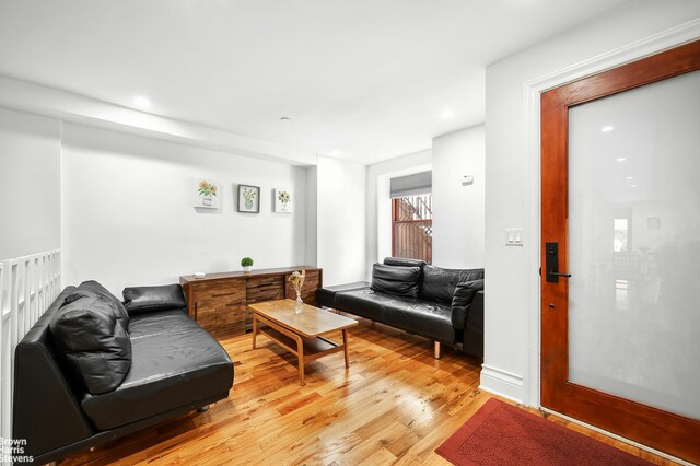 living room with hardwood / wood-style flooring