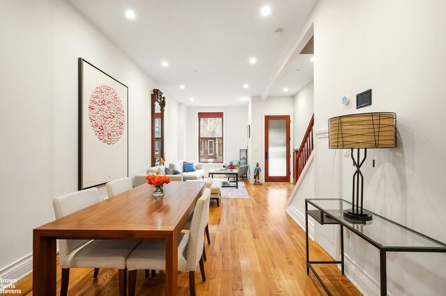 dining room with light hardwood / wood-style flooring