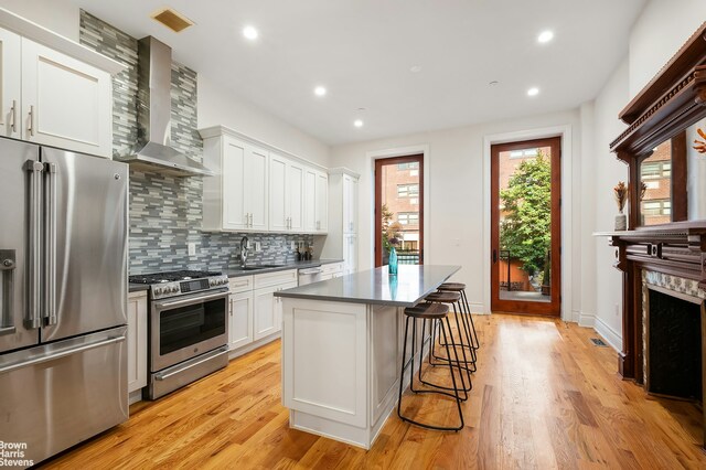 bedroom with light hardwood / wood-style floors