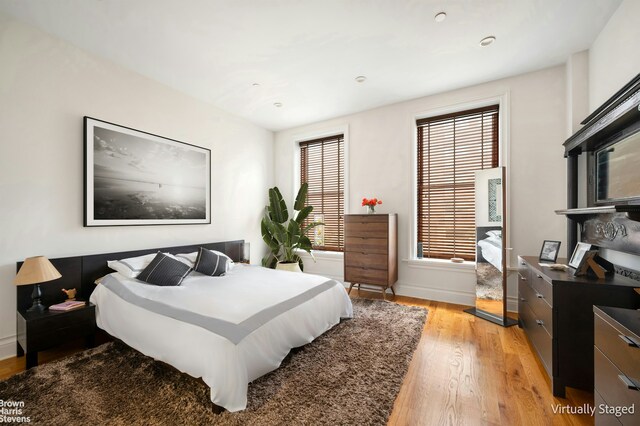 sitting room featuring light hardwood / wood-style flooring