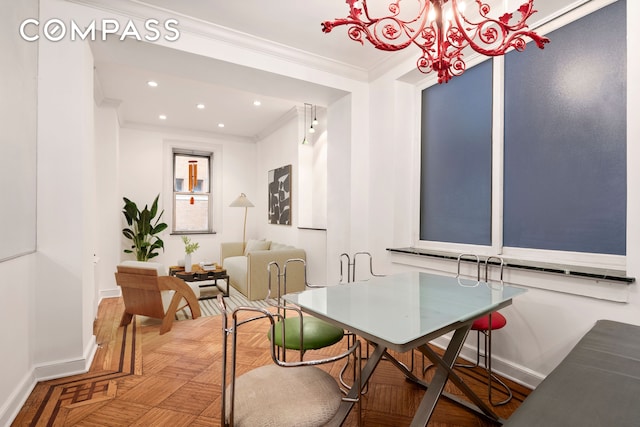 dining room with crown molding, baseboards, recessed lighting, and a chandelier