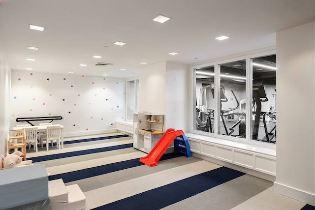 playroom with baseboards, visible vents, and recessed lighting