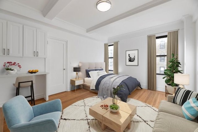 bedroom featuring ornamental molding, beam ceiling, and light hardwood / wood-style flooring