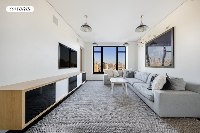 living area with carpet floors and visible vents