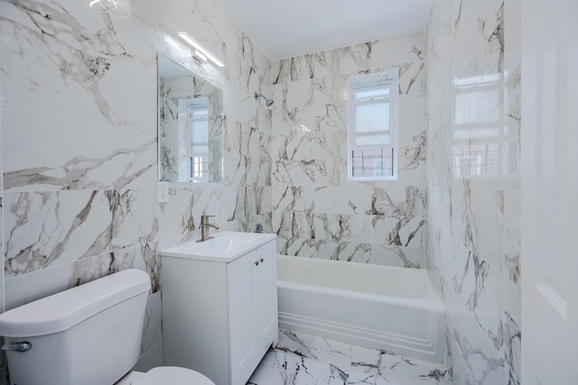 bathroom with marble finish floor, bathing tub / shower combination, vanity, and toilet