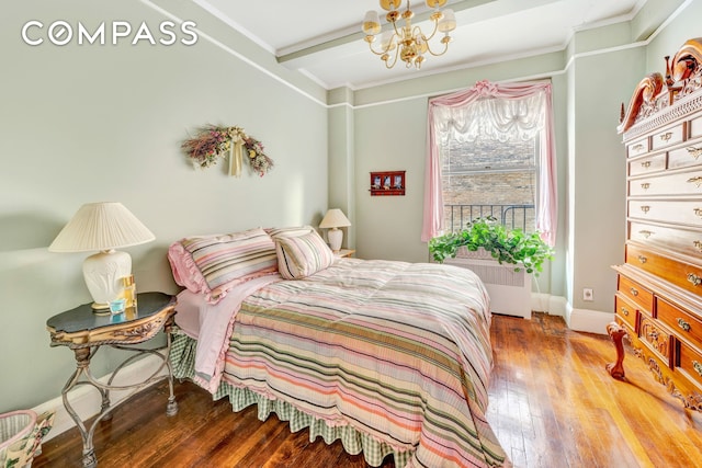1060 Park Ave Unit 3B, New York City, NY 10128 - bedroom featuring radiator, hardwood / wood-style flooring, a chandelier, beamed ceiling, and crown molding
