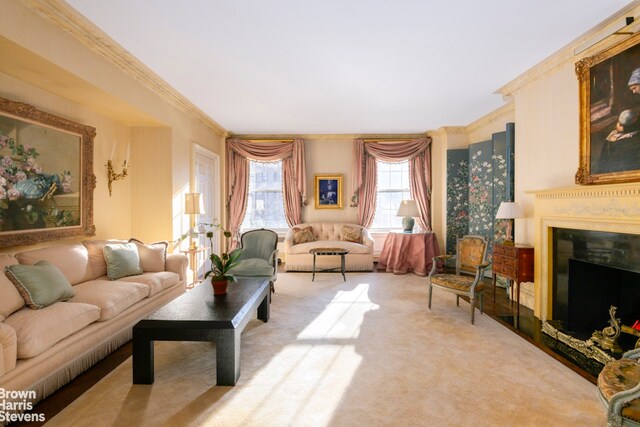 carpeted living room with crown molding