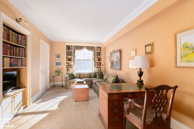 office space featuring crown molding, built in features, and light carpet