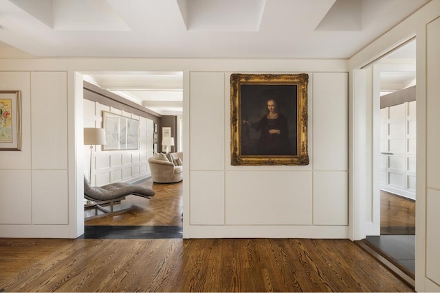 hallway with dark hardwood / wood-style floors