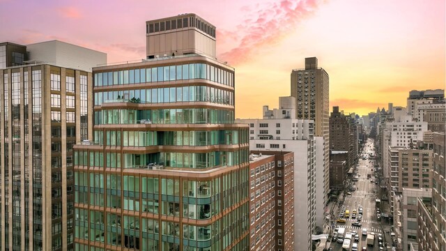 view of outdoor building at dusk