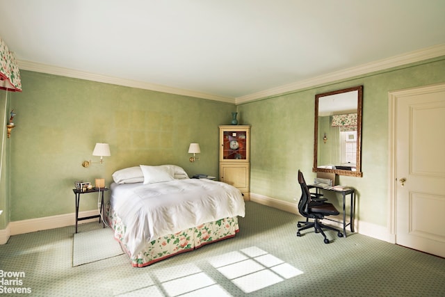 bedroom featuring ornamental molding and carpet