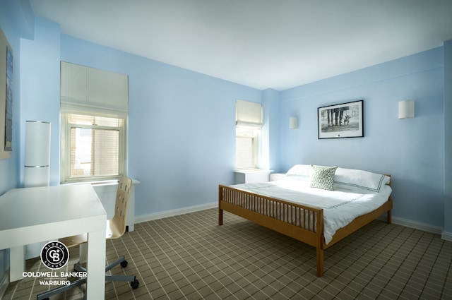 bedroom featuring white fridge