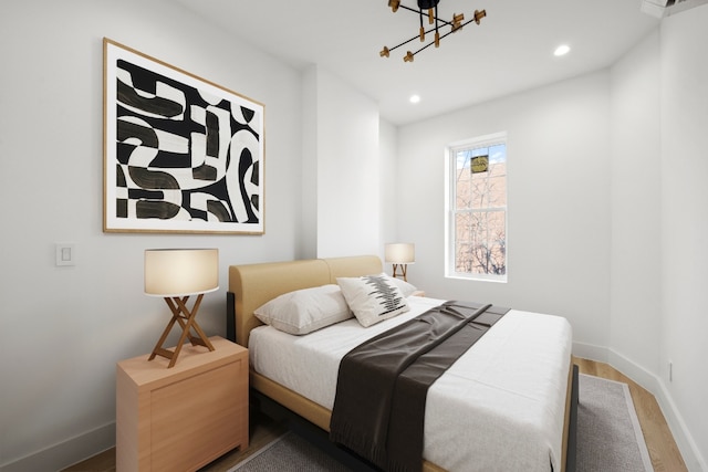 bedroom featuring dark hardwood / wood-style flooring