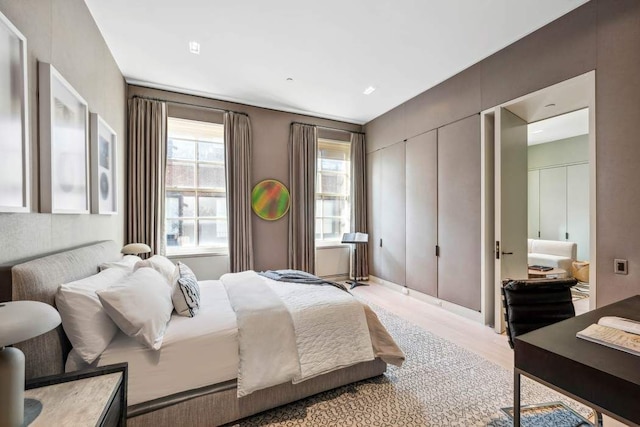 bedroom featuring light wood-type flooring