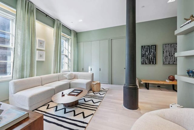 living room with light hardwood / wood-style floors