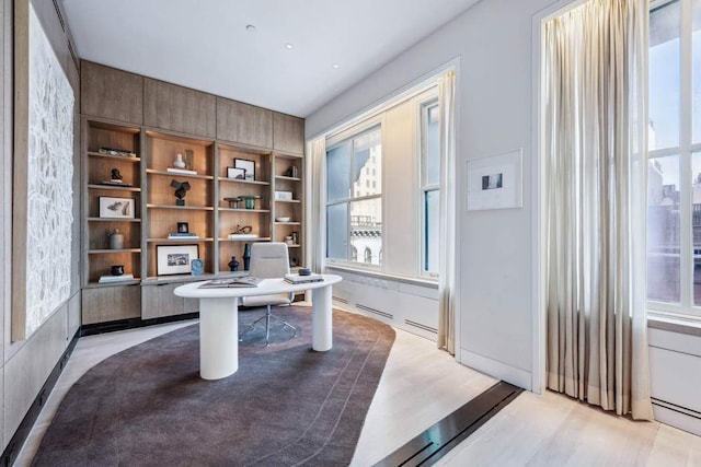 office area with light wood-type flooring