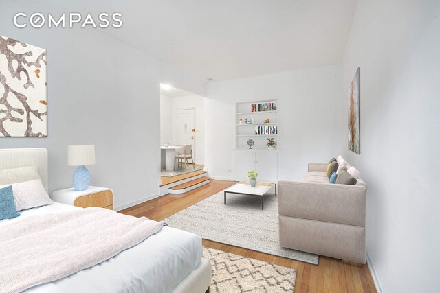 bedroom featuring wood-type flooring