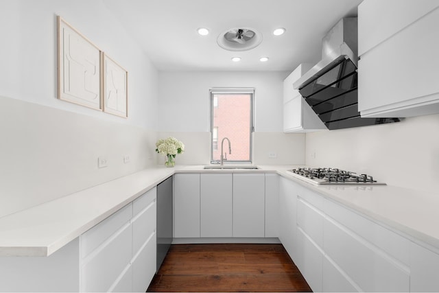 103 W 89th St Unit 3/4A, New York City, NY 10024 - kitchen featuring dark wood-style flooring, a sink, light countertops, stainless steel appliances, and white cabinetry
