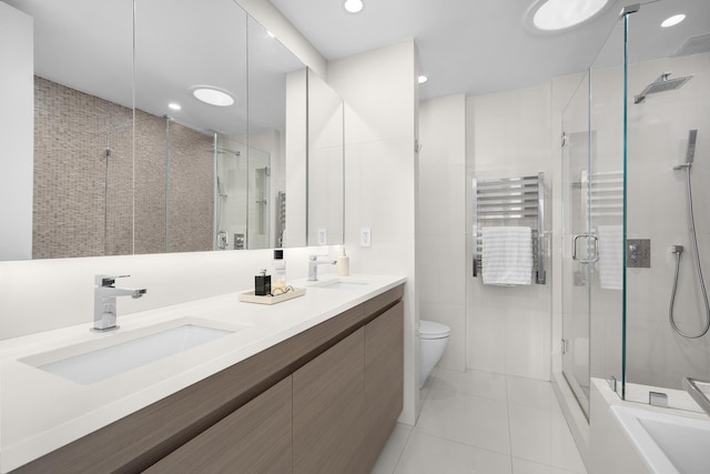 103 W 89th St Unit 3/4A, New York City, NY 10024 - full bathroom featuring tile patterned flooring, a sink, a stall shower, and toilet
