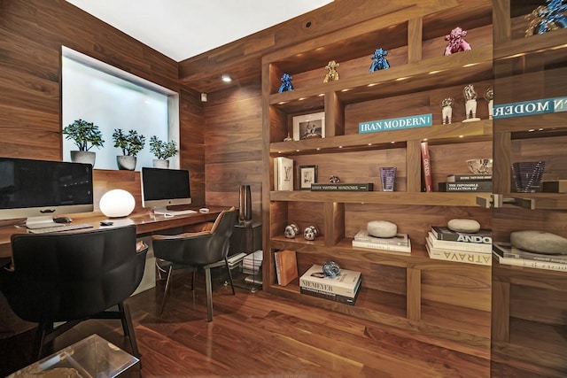 office featuring wooden walls and wood finished floors