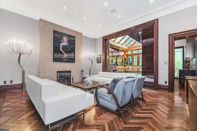 home theater featuring crown molding, baseboards, and a tile fireplace