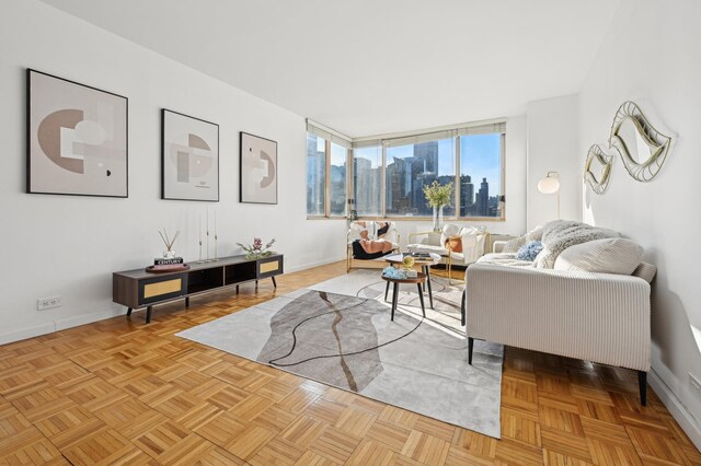 living room featuring light parquet floors