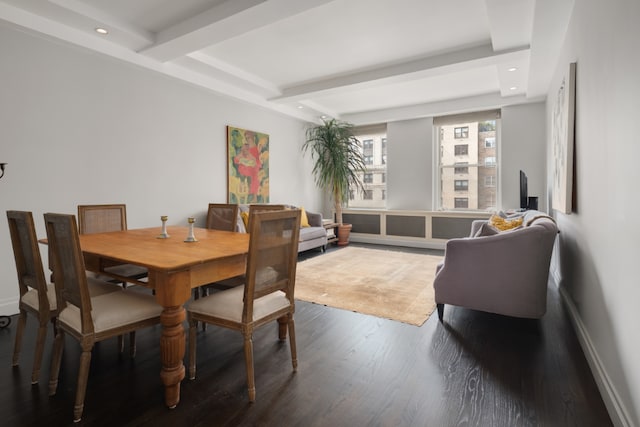 dining space featuring beam ceiling and hardwood / wood-style floors