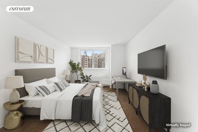 200 E 94th St Unit 1012, New York City, NY 10128 - bedroom featuring wood finished floors