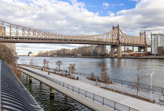 447 E 57th St Unit 14, New York City, NY 10022 - dock area featuring a water view