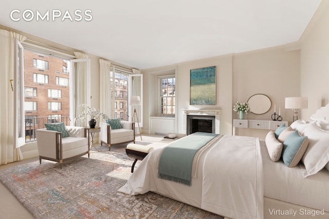 447 E 57th St Unit 14, New York City, NY 10022 - bedroom featuring a fireplace