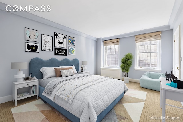 bedroom featuring baseboards