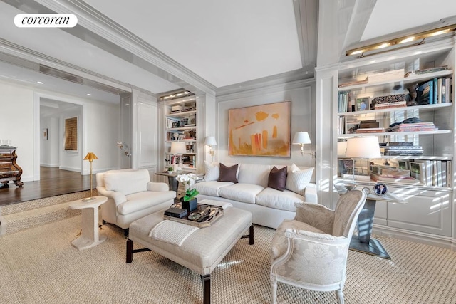 living room with ornamental molding, wood finished floors, and visible vents