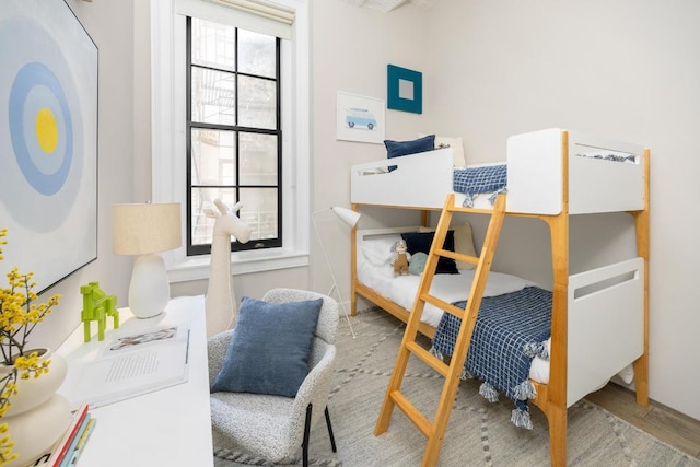 bedroom featuring wood-type flooring