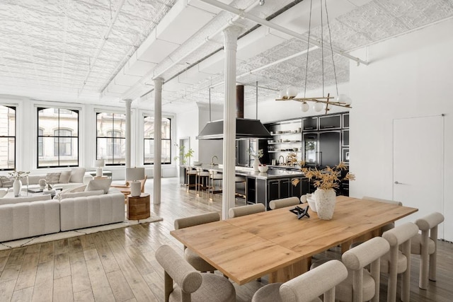 dining space featuring hardwood / wood-style floors