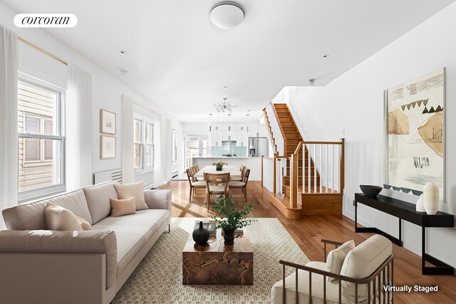 living room with light hardwood / wood-style floors