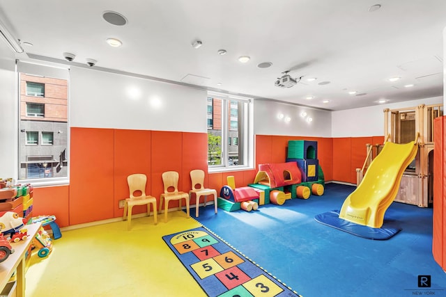 game room featuring recessed lighting