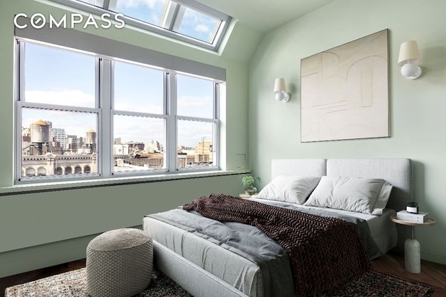 bedroom with hardwood / wood-style flooring and lofted ceiling