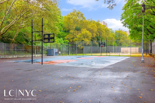 view of sport court with community basketball court and fence