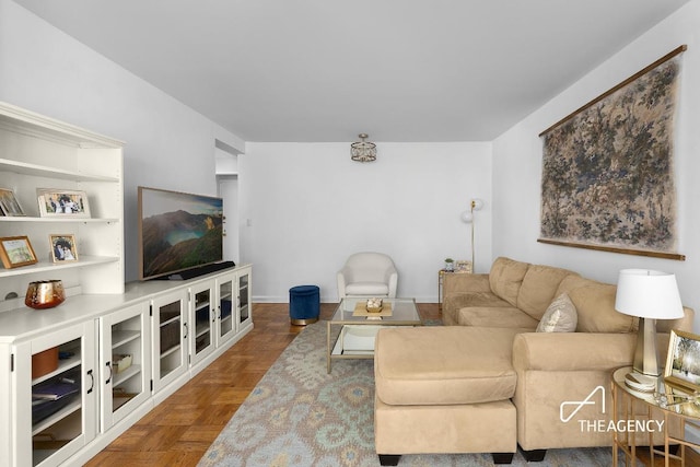 living room with parquet flooring