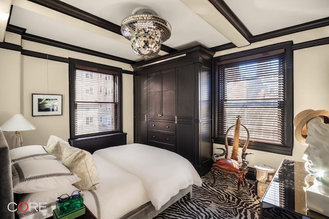 bedroom featuring crown molding, beam ceiling, and a chandelier