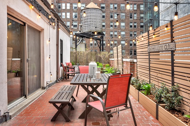 view of patio featuring outdoor dining area