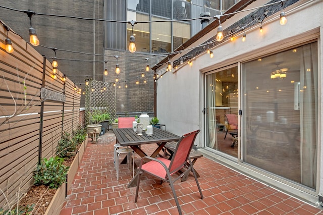 view of patio featuring outdoor dining area