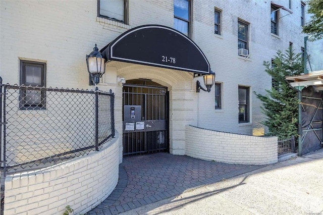 property entrance featuring cooling unit